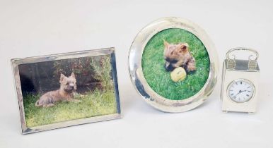 Edward VII silver desk clock, and two photograph frames