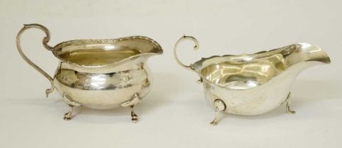 George V silver sauceboat and an Edward VII silver cream jug