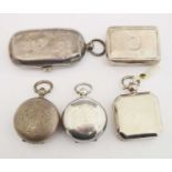 Four silver sovereign and coin cases and a George III silver vinaigrette