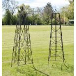 Two wrought iron bean frame obelisks