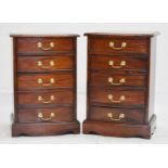 Pair of reproduction mahogany five-drawer bedside chests of drawers