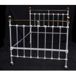 White-painted iron and brass double bed