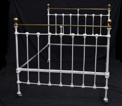White-painted iron and brass double bed
