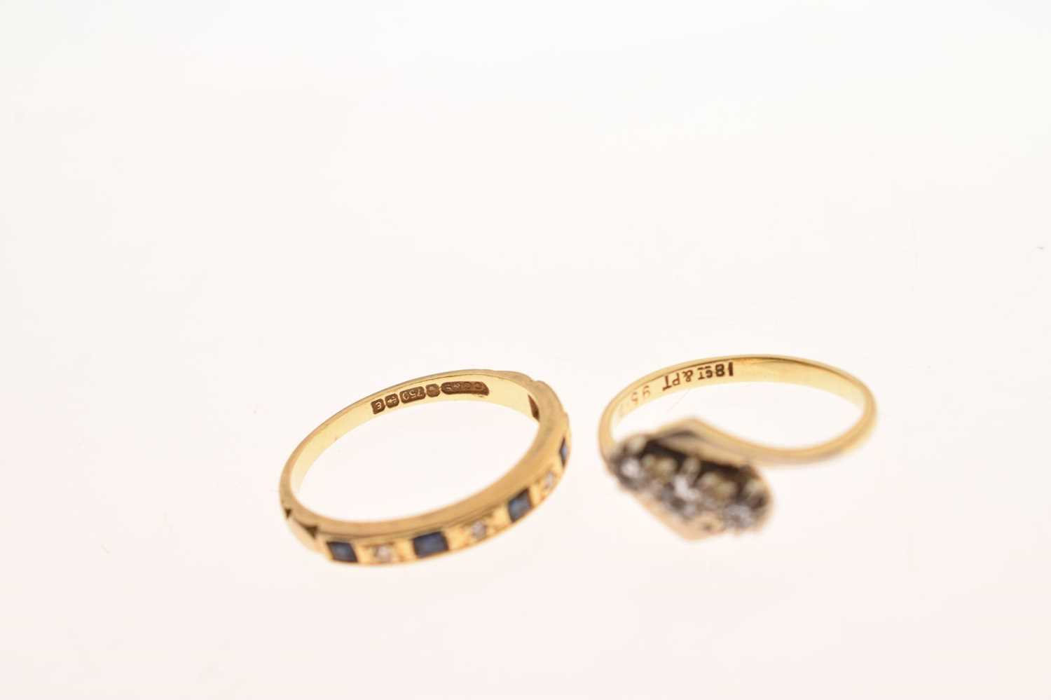 Diamond three-stone crossover ring, and a sapphire and diamond 18ct gold half eternity ring (2) - Image 6 of 6