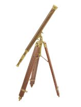 Reproduction brass cased telescope, on a wooden tripod stand