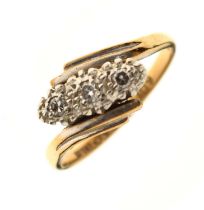 Diamond three-stone crossover ring