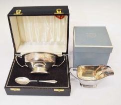 Silver twin handled bowl and spoon, boxed and a silver sauce boat