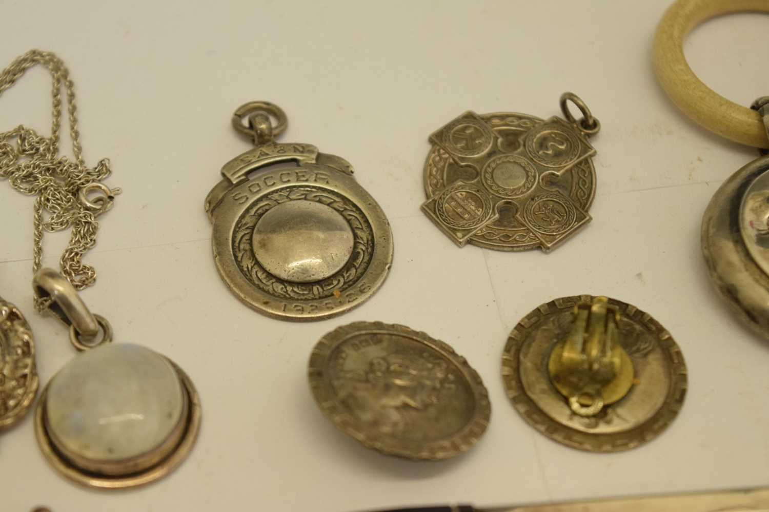 Quantity of silver fobs, buttons, a child's moon-faced teething ring/rattle, etc - Image 5 of 12