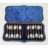 Late Victorian cased set of twelve teaspoons and a pair of sugar tongs