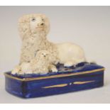 Staffordshire inkstand modelled as a poodle and pup