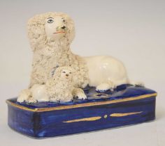 Staffordshire inkstand modelled as a poodle and pup