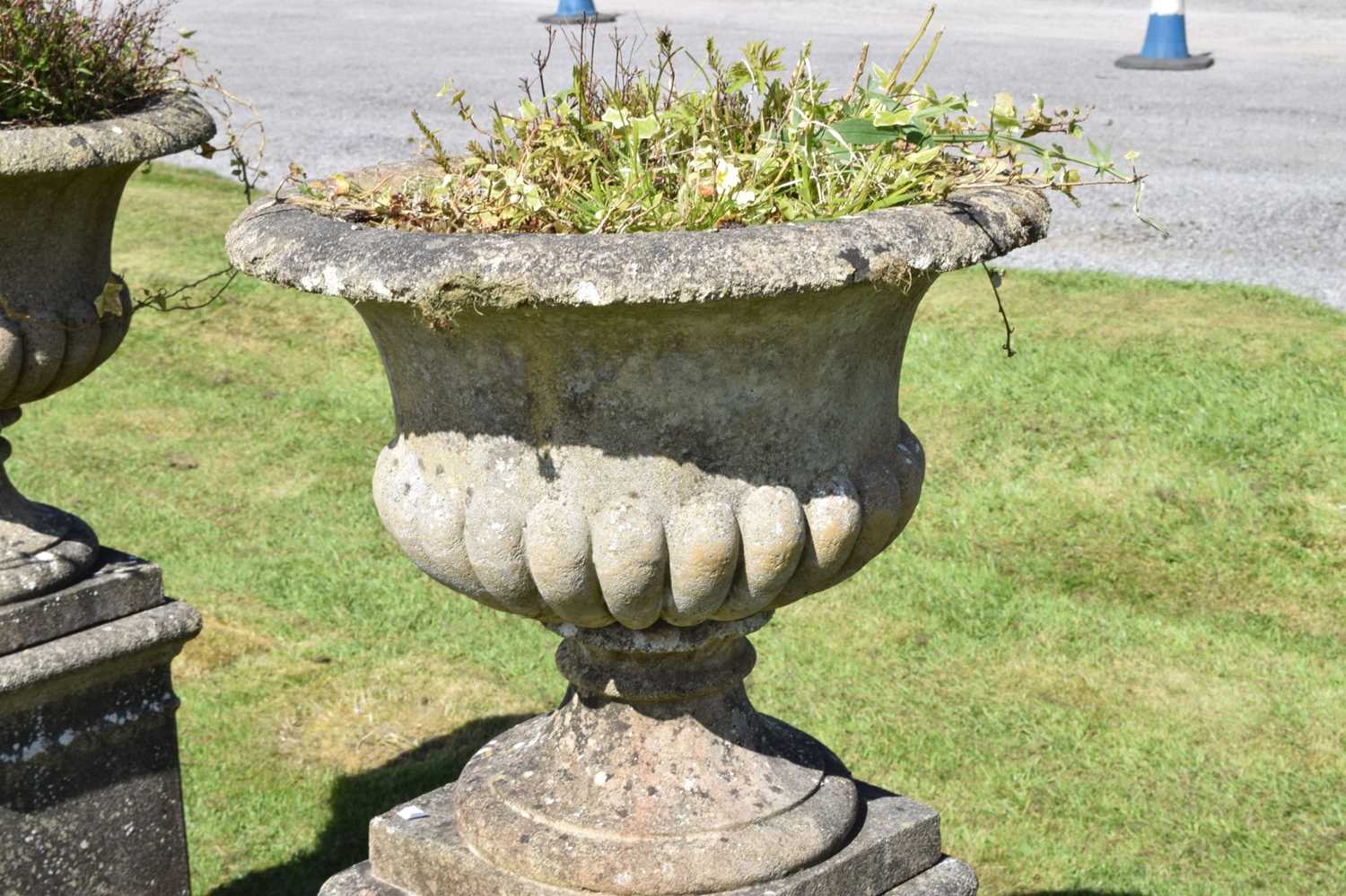 Pair of composition stone garden urns and pedestals - Image 5 of 8