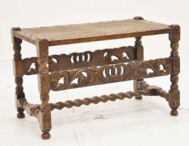 Carved cane-seat stool/luggage rack