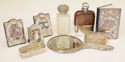 George V silver-backed hand mirror, three photo frames, etc