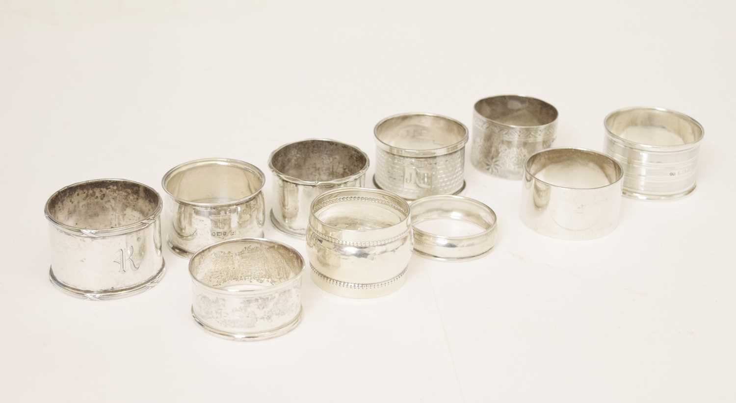 Ten late 19th/early 20th century silver napkin rings