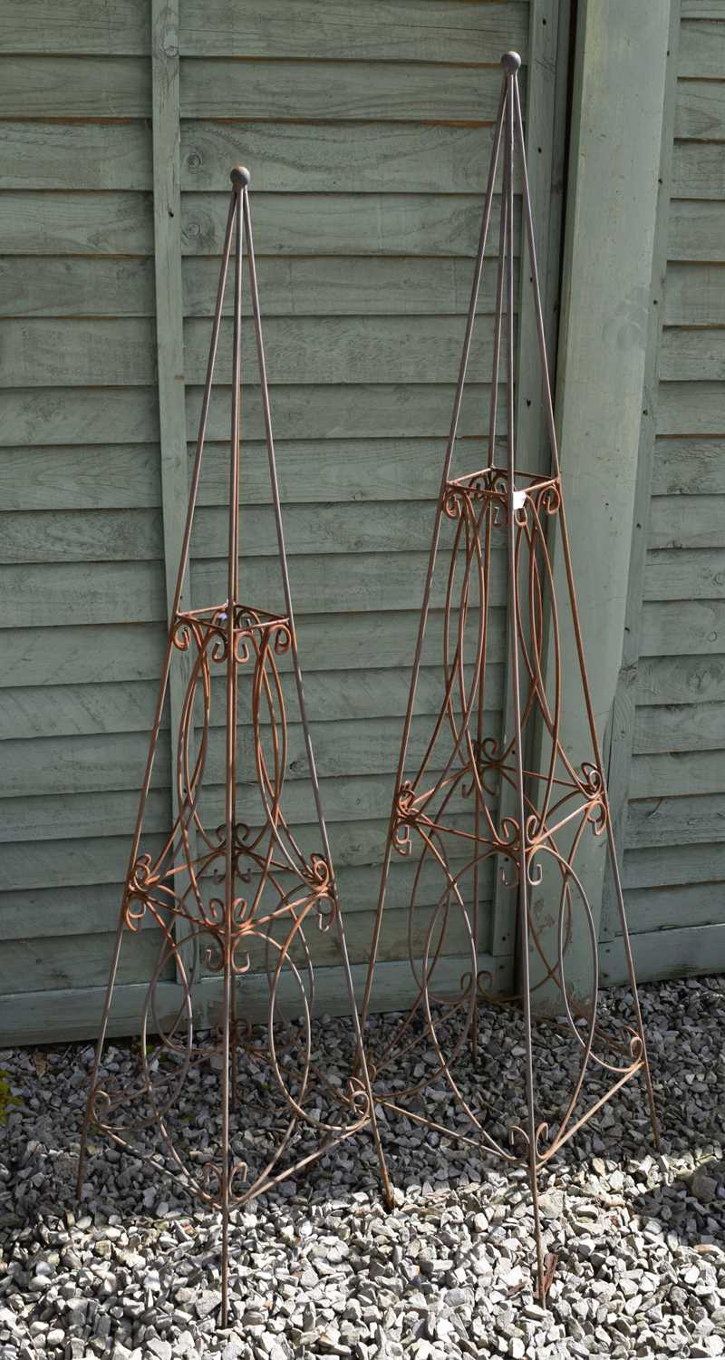 Two metal obelisk-form garden frames