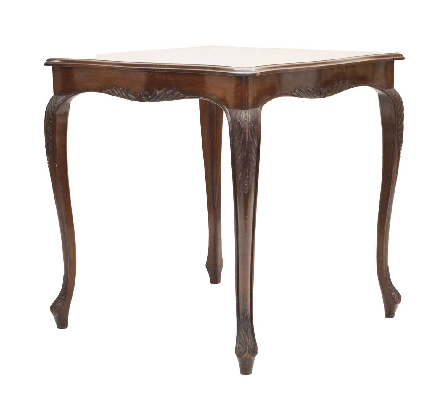 Edwardian carved walnut serpentine centre table