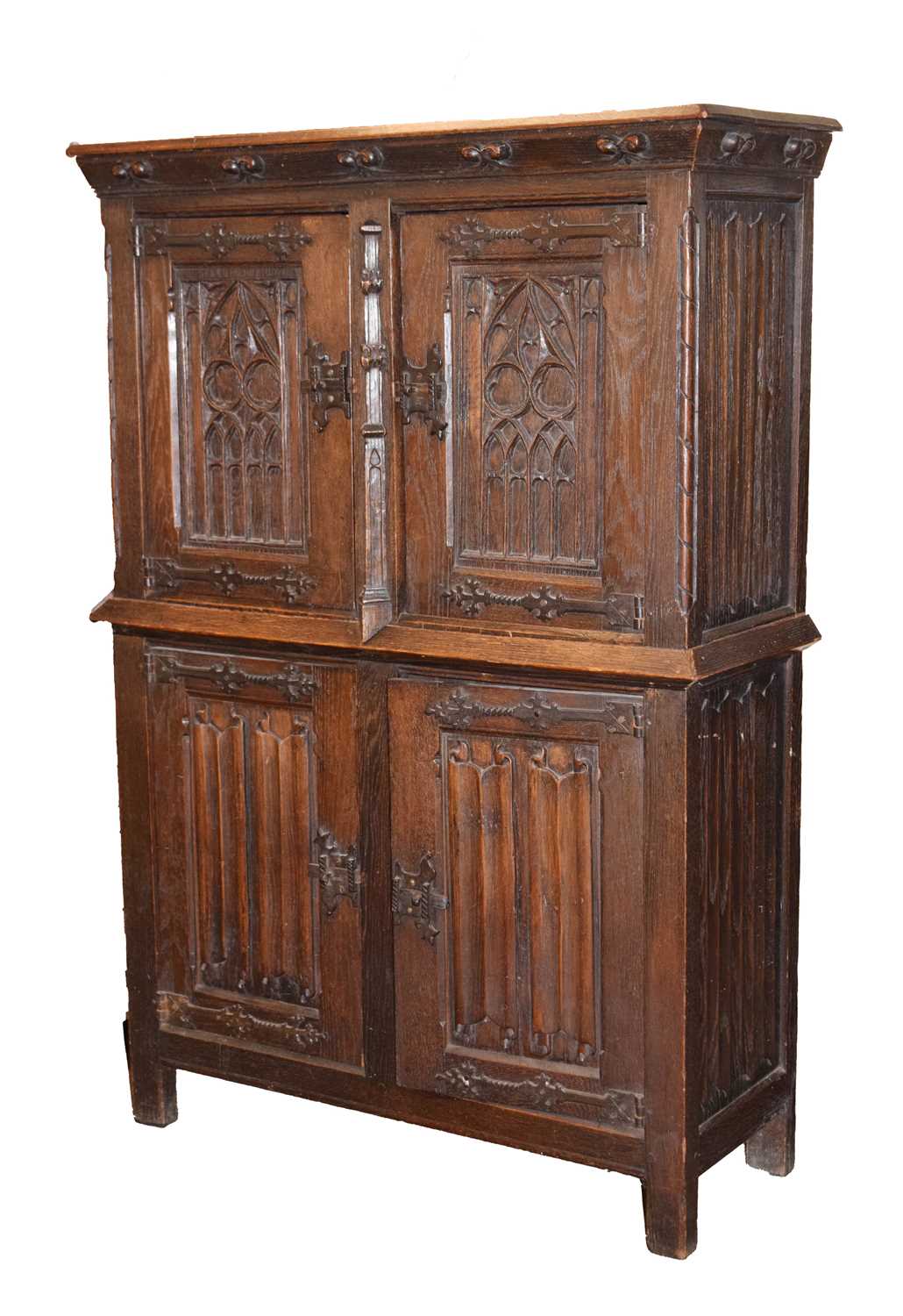 Early 20th century oak gothic revival two section cupboard