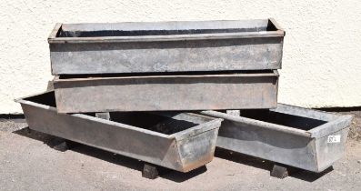 Four galvanised metal garden troughs