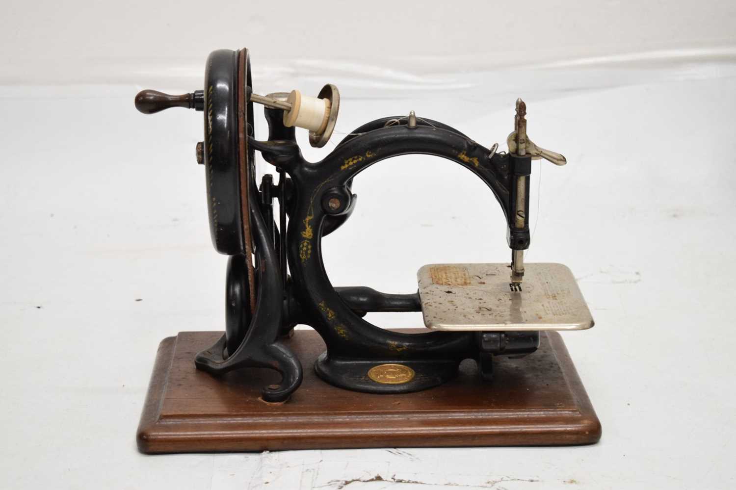 Late 19th century Willcox & Gibbs C-frame hand-cranked sewing machine - Image 2 of 9