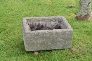 Belfast sink repurposed into a reconstituted stone garden planter