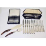 Cased set of six George V silver handled butter knives, cased pair of silver plated fish servers, et