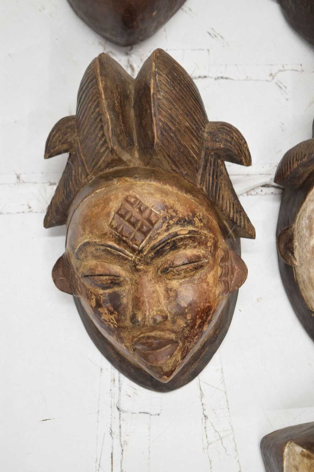 Group of ten carved wall hanging masks - Image 7 of 8