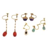 Three pairs of earrings including a pair of 'cherry amber' earrings