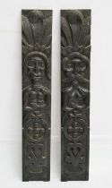 Pair of carved oak Atlantes or figural pilasters