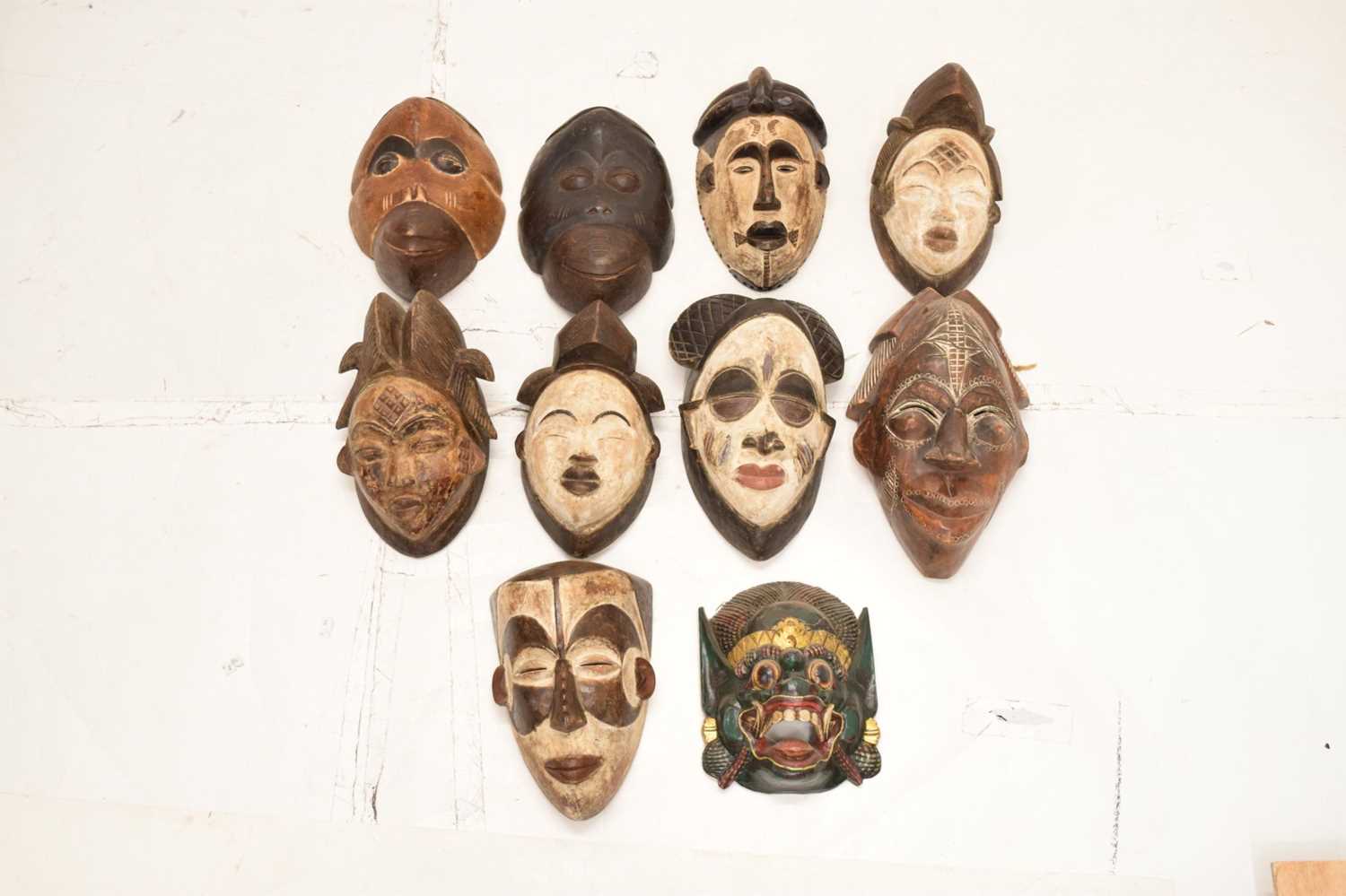 Group of ten carved wall hanging masks - Image 2 of 8