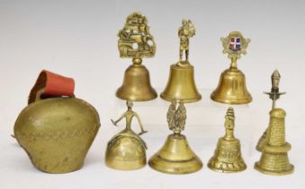 Group of eight brass hand bells, etc