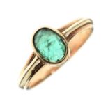 9ct gold ring set a faceted oval green gemstone