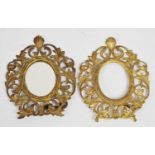 Pair of 20th century gilt cast oval frames