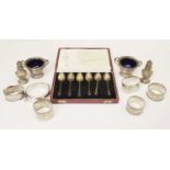 Silver teaspoons (cased), napkin rings, cruet, etc.