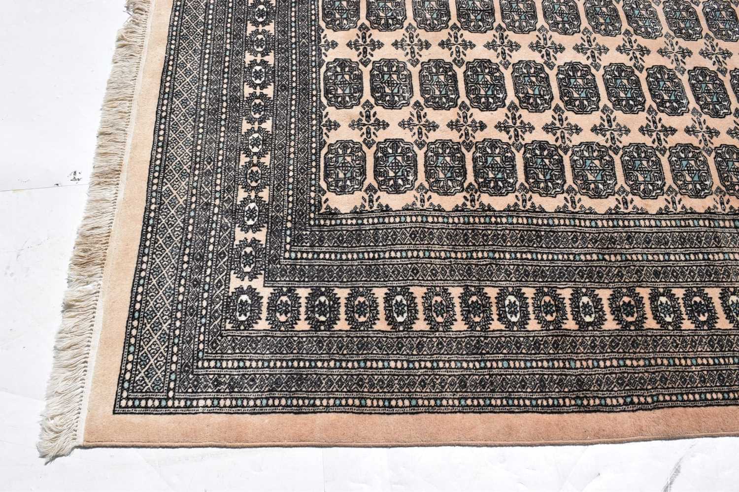 Machine made Afghan-style wool rug - Image 2 of 13