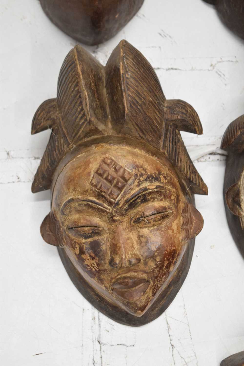 Group of ten carved wall hanging masks - Image 3 of 8