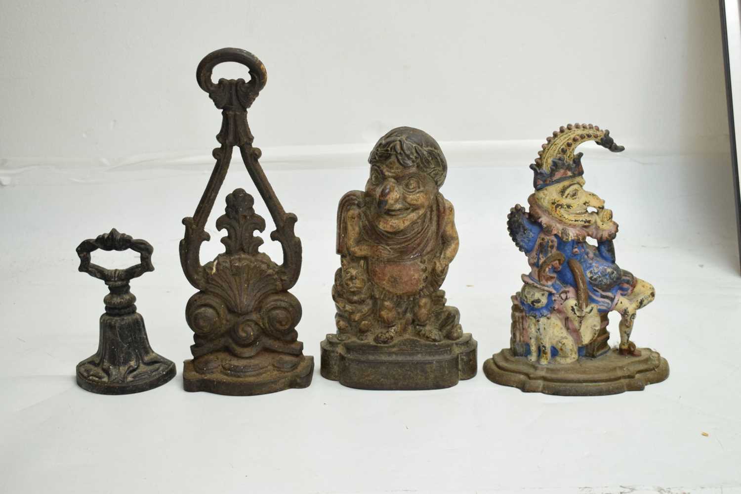 Two early 20th century cast iron Mr Punch doorstops and two other - Image 2 of 6