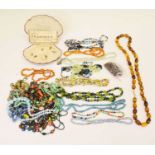 Costume jewellery to include amber, bone, garnet, hardstone bead necklaces and cased simulated pearl