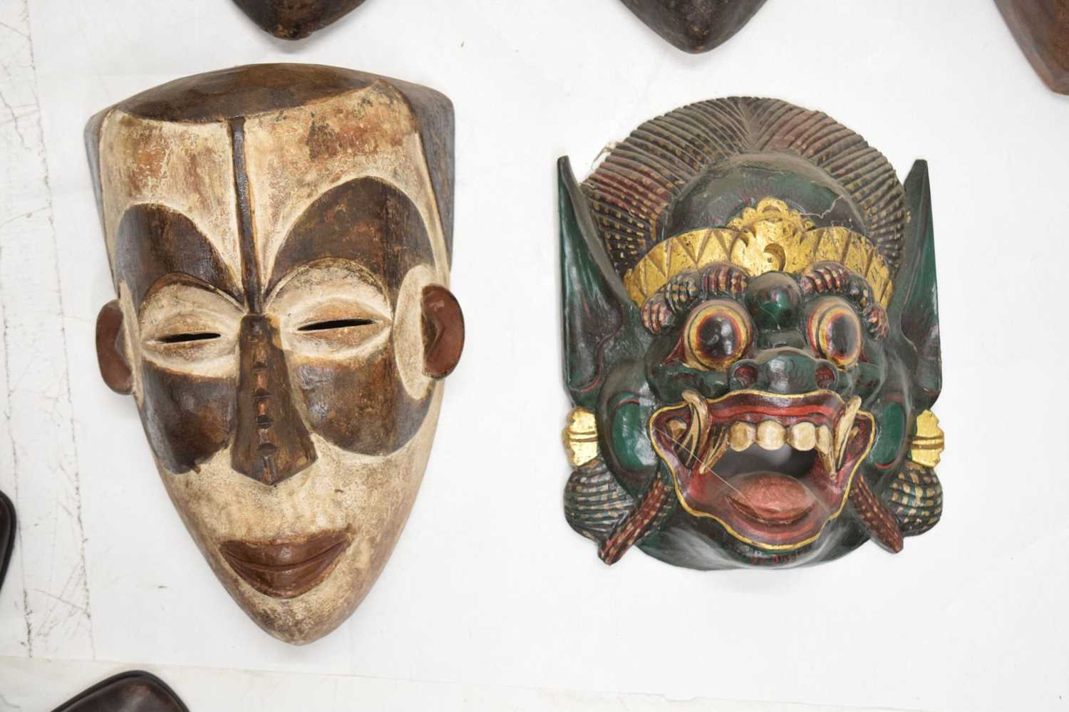 Group of ten carved wall hanging masks - Image 8 of 8