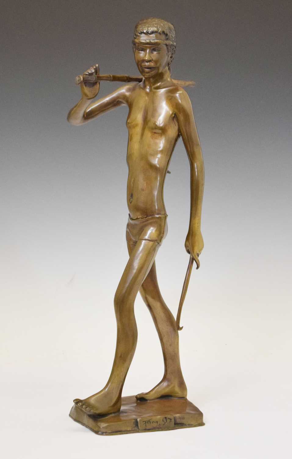 Modern bronze figure of a hunting tribesman