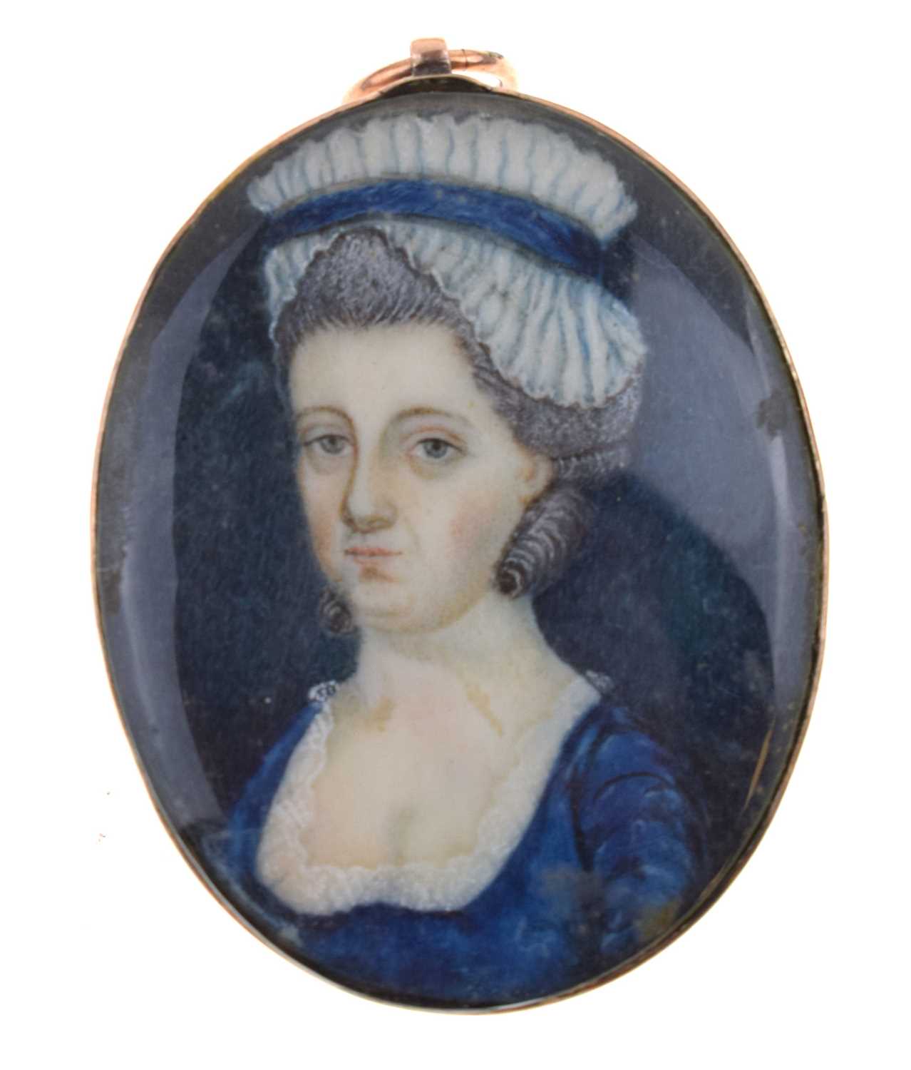 19th century small oval portrait miniature of a lady in a blue dress