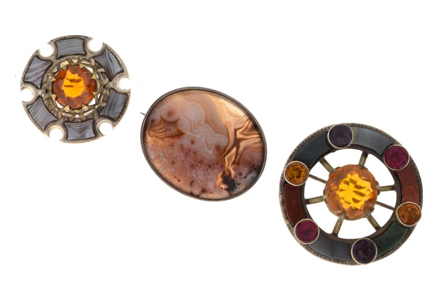 Two Scottish-style agate and gem-set silver brooches