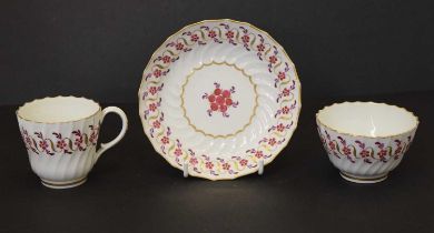 Late 18th century fluted porcelain teabowl, cup and saucer