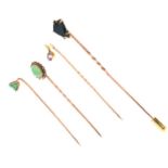 Four gem-set stick pins,