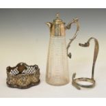 Victorian cut glass claret jug, a silver plated bottle coaster, and a wine bottle carrier