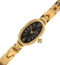 Lady's yellow metal stamped 585 bracelet watch