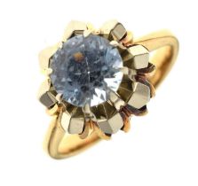Single stone ring, claw set a faceted round pale blue stone