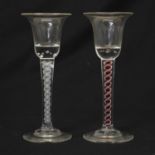 Two 18th century style opaque twist glasses