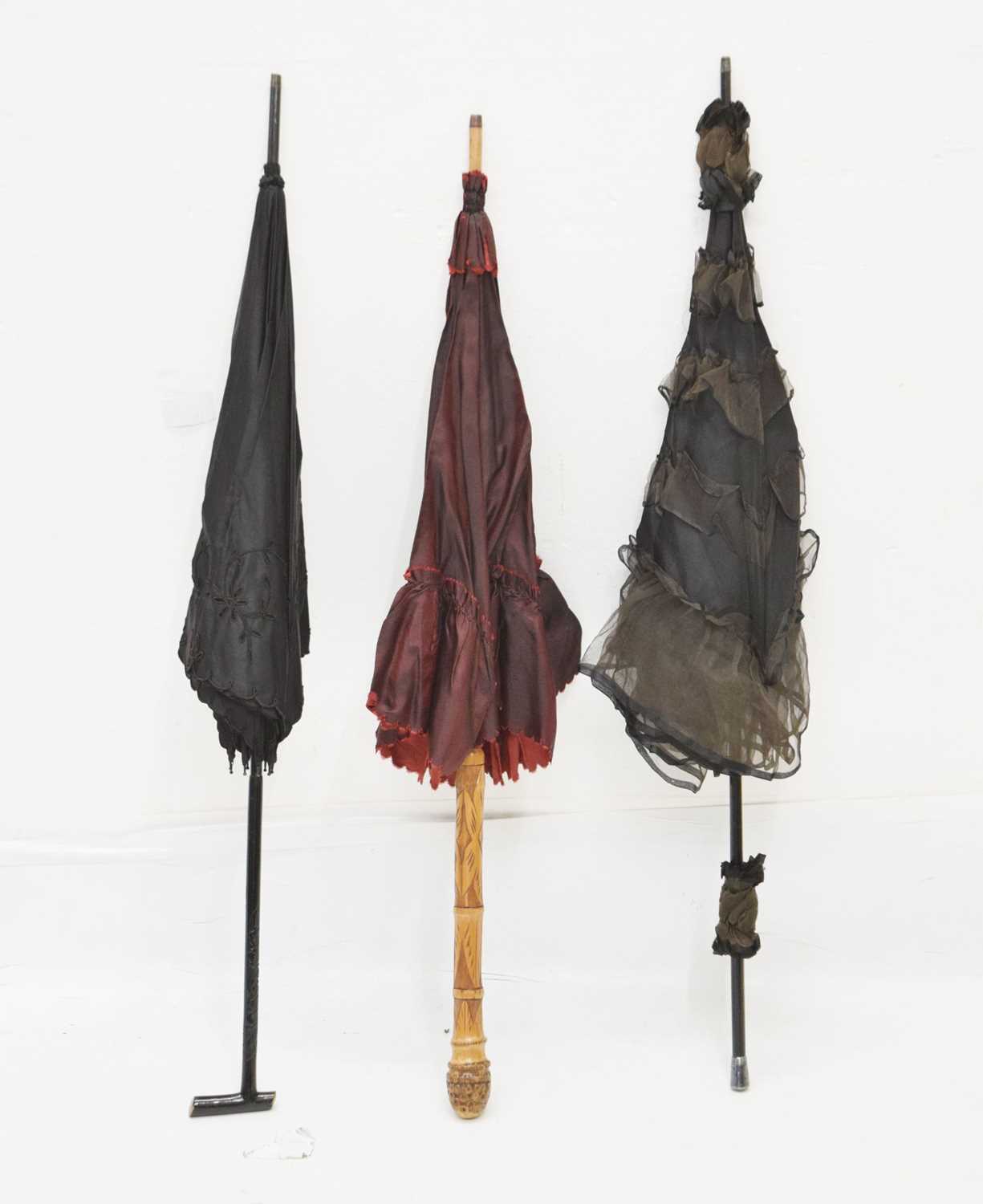 Paragon black silk parasol and two other examples