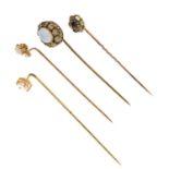 Four gem-set stick pins